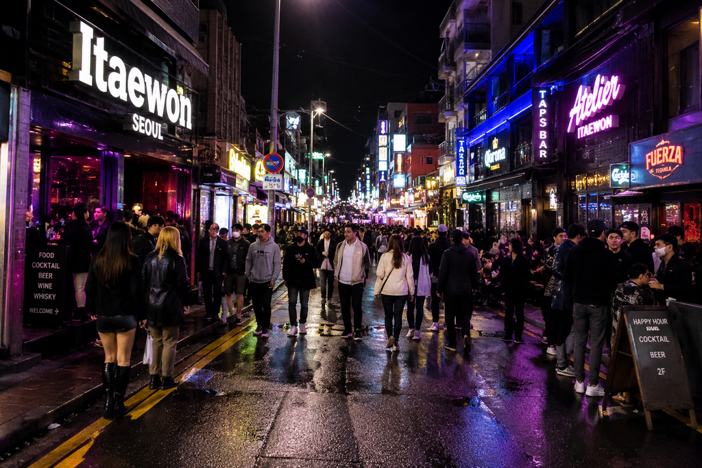 Itaewon nightlife street in Seoul with bars, restaurants, and international visitors